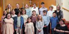 Back Row: Johanna Pickard, Annie Scandrett, Linea Koch, Noah Koch, Brayden Marron, guest pianist Camden Walker, and studio teacher – Anna Jeanne Flesner. Middle Row: Cora Scandrett, Cassandra Scandrett, Claire Wambeke, Lillie Hoff, Braxden Marron, and James Hohler. Front Row: Willow Hoff, Grace Wambeke, Grace Hohler, Georgia Carlson, and Bella Hoff.
