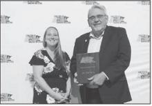 State Sen. Bill Weber (R-Luverne) is presented with the Coalition of Greater Minnesota Cities’ Minnesota Legacy Award.