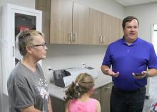 Nobles Cooperative General Manager Adam Trombley visits with guests during the new building’s open house.