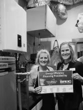 Maddy Robinson, Broadway Beauty Salon of Slayton, recently completed her radiant floor heating system as a result of a PACE loan. She is picture with SRDC’s Deputy Director, Robin Weis