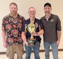 Chili Challenge Winners: Jon Heidebrink (left) and Jarrod Larson (right), Pictured with Lion Member Rick Like (middle)