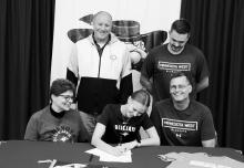 Pictured above with Kate are her family, Mom Stacy, Dad Mark and Brother Noah along with Minnesota West Assistant Volleyball Coach CJ Nelson.
