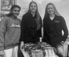 Fulda FCCLA members Grace Sawadogo, Brynlee Farris and Mara Clarke packed hospital bags for patients at Sanford Hospital as their project. The packed bags were delivered to Sioux Falls Children’s Specialty Clinic.