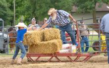 Above: Feed team competition is a timed event where each hitch needed to load and unload at four different stops. Below: Schreiber Percherons