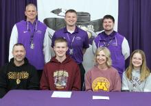 Andrew Holm signed his Letter of Intent to play football at the University of Minnesota-Morris on Wed., April 9. Andrew is pictured here with his Family: Jason,
