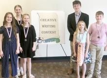 Pictured above are the MCC participants of the Creative Writing Competition Awards Ceremony on April 13th. Front: Caroline Stoel, Cassie Scandrett, Maggie Keller, McCoy Ackerman. Back Annie Scandrett, Blaine Braun.