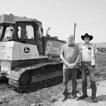 Murray County Engineer Randy Groves meets with Contegrity Group Job Supervisor Jim Theurer.