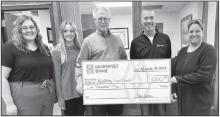 Minnwest staff is proud to support the Murray County Food Shelf. L to R. Shauna Senn, Charity Kunselman, Tim Lange (Murray County Food Shelf), Neal Everson and Misse Swanson.