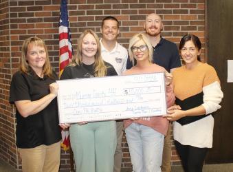 Alex Knutson American Family Insurance, working in conjunction with Currie Town and Country, raised $10,000 for Murray County 4-H during its Cow Pie Bingo event during the Murray County Fair. Pictured L to R (Front): Kim Hause, Kerstin Thoms, Amy Johnson-Loosbrook, Kim Thooft; Back: Alex Knutson, Dalton Slinger