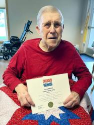 Mike Kuehl with his Quilt of Valor