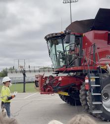 Cody Hansen, Nobles Cooperative Electric Line Superintendent, walked students through three real-world scenarios involving farm equipment and electrical hazards. Hansen demonstrated what can happen when a large sprayer becomes entangled in an overhead power line. Students also saw a scenario involving a combine coming into contact with an overhead power line.
