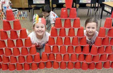 First Grade Celebrated the 100th Day of School and also collected over 100 cans of food, building a tower of kindness. We have been learning about kindness and all canned food items that were collected were donated to The Murray County Food Shelf. They also sang the National Anthem at the Girls Basketball Game.