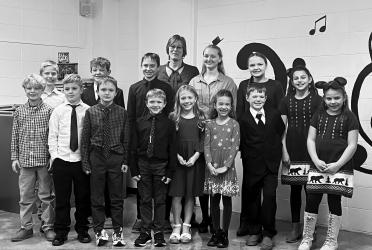 On December 10th these students gave a beautiful recital under the direction of Christie Gergen, MCC Elementary Music Director. Front row (left to right): Camden Walker, Mason Hoffmann, Brennly Plotz, Elliot Plotz, Everly Ahlers, Amiyah VanEck, Brennen Heronimus, Kenzie Platt. 2nd row (left to right): Easton Hoffmann, BR Heronimus, Gary (Dane) Plotz, Alex Schuur, Brielle Plotz, Kiana Platt, and Mrs. Christie Gergen.