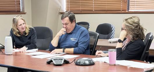 Nobles Cooperative Electric interview committee in deliberation (left to right) Tracey Haberman (Member Services Manager), Adam Tromblay (CEO/ General Manager) and Amy Rucker (Executive Assistant).