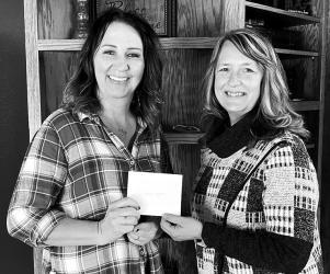 Best Lit Home: Mary Engbarth’s home was chosen as the best lit home. Her residence along Hwy. 30 on the west edge of Slayton brightens up the area. She credits her son, Riley, for the creation. Mary received $50 in Chamber dollars from Chamber President, Sheila Crowley.