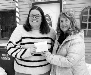 Holiday-Themed Home: Jenny Jacobson’s home was chosen for this year’s ‘Themed’ decorating winner. The gingerbread home included lollipops, candy canes, plus much more. Jenny received $50 in Chamber dollars from Chamber President, Sheila Crowley.