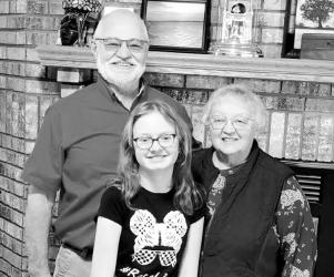 Holidays Blown Up: The home of Jim and Sandi Gertsema was chosen as this year’s ‘Holiday Blown Up’ winner. Jim and Sandi are pictured with their granddaughter, Lily, who they credit for helping with the creation and the ‘push’ to do it. The Gertsemas received $50 in Chamber dollars.