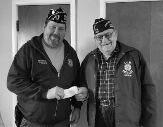 Pictured to the Right: Slayton American Legion Post 64 Commander Brad Pagel accepting $800 donation from Slayton VFW Post 6322 toward the Vietnam Wall and Cost of Freedom displays coming to Slayton during the Murray County Fair Aug 15-20 2023.