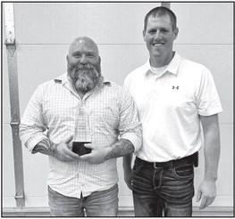 Retired Member of 23 years Andy Kleven, pictured with Fire Chief Chris LeTendre.