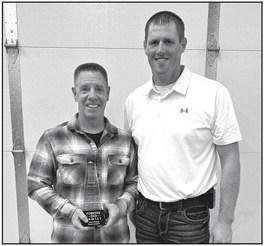 Retired Member of 21 years Chris Jacobson, pictured with Fire Chief Chris LeTendre.