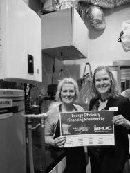 Maddy Robinson, Broadway Beauty Salon of Slayton, recently completed her radiant floor heating system as a result of a PACE loan. She is picture with SRDC’s Deputy Director, Robin Weis