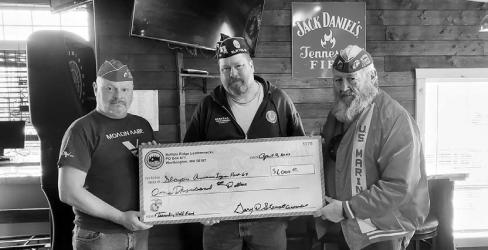 Slayton American Legion Post 64 Commander Brad Pagel accepting $1000 donation from Buffalo Ridge Leathernecks Detachment 1463 Worthington MN toward the Vietnam Wall and Cost of Freedom displays coming to Slayton during the Murray County Fair Aug 15-20 2023. Left to right Vance Johanning, Brad Pagel, Gary Stewart