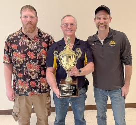 Chili Challenge Winners: Jon Heidebrink (left) and Jarrod Larson (right), Pictured with Lion Member Rick Like (middle)