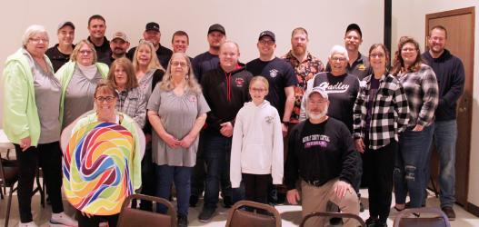 Pictured: L to R: Front: Shannon Beers, Stella Obermoller, Jim Siedschlag. Middle: Sandy Beers, Connie Sorenson, Jo Dierks, Debbie Helmke, Dar Like, Austin Boock, Muriel Pearson (“representing Kathy Herding”), Janese Siedschlag. Back: Keith Carlson, Justin Hoffmann, Tyler Johnson, Corey Lickness, Cody Hansen, Austin Irlbeck, Nick Obermoller, Jon Heidebrink, Jarrod Larson, Amy Nepp, Andrew Nepp.