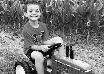 Rhett was the lucky winner of the tractor!