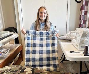 Jayda Hellewell uses cotton canvas and wool to create dog beds.