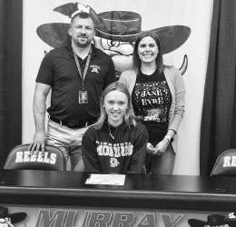 Coach Dominick Damm and Coach Kristin Nau are pictured with Lindsay as she signs her letter.