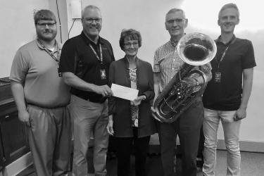 L to R: Mike Helgeson (Band), Superintendent Joe Meyer, Nancy Pierson Laible (representing the Foundation), Doug Pierson (Community Sound System Volunteer), and Isaac Harms, (Drama)