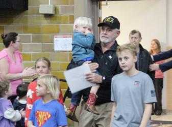 Veterans escorted by family