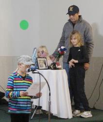 Reciting the reasons for the American Legion “Child’s Table.”