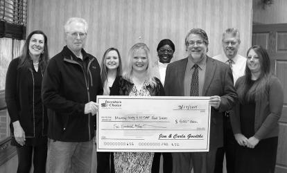 Investors Choice Financial donated a total of $1,000 to the following organizations. $500 each to Murray County and Fulda Food Shelves. This is an annual Murray Lodge #199 Food Shelf Fundraiser. Receiving the check from Carla and Jim Goedtke is Tim Lange, representing Murray Lodge #199. Investors Choice employees in the back row include: Amanda Leach, Zoey Logan, Alice Gomez, Kevin Elton, and Melissa Fransen.