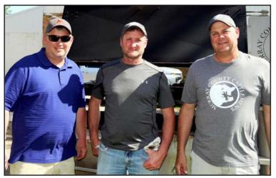 Burgers grilled by the Murray County Cattlemen’s Jason Larson, Bob Ford, Mike Kluis.