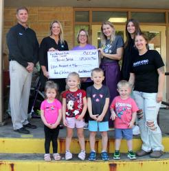 First National Bank Fulda-Slayton donated $15,000 toward the Wonder World Capital Campaign for the new childcare center. Pictured (L to R): Back - Brian Gass, Genell Hollahan, Kristin Petros, Amber Hartle, Hannah Frisk. Front - Tessa Cowan, Whitley DeLong, Gideon Radke, Baylor Salmon, and Brittany Carlson.