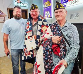Currie American Legion Post 322 recently honored Denny Johnson and Kenny Bassett with Quilts of Valor.