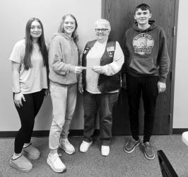 Slayton Riders Donation Photo: (L to R) – Royalle Siedschlag, Joelle Hellewell, Sharon Staples (Slayton Riders member) and Wesley Hause
