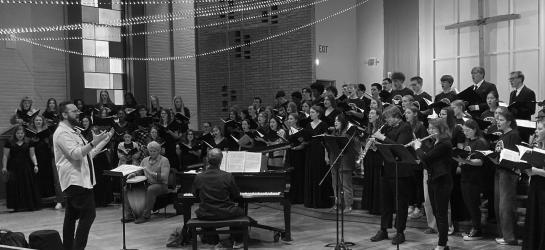 Concordia Honor Choir members performing with the Christus Chorus University Choir.