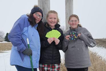 Winning the Fulda Parade of Lights Medallion Hunt were (L to R) Tanya Reynolds, Natalie Slinger and Mara Danneman. Clues were posted on the Fulda Area Community Club Facebook page throughout the week beginning on Sunday, November 30th. The Medallion was found on Saturday morning by the Welcome to Fulda, Home of the Wood Duck sign, located just north of the city on U.S. Highway 59.