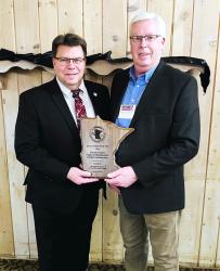 Special Project of the Year Award: Murray County Highway Maintenance Facility Construction was Presented by Lon Aune (Marshall County Engineer) to Randy Groves, Murray County Engineer.