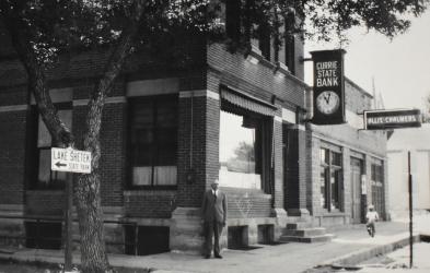 Henry Eiselein in front of the Bank with the New Clock (1930’s)