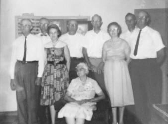 This photo was taken in 1968, It is of Katherine Onken and some of the children. L to R are: Ben, Carl, Claramae, Bill, Delbert, Helen, Ray and Vernon.