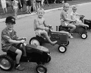 These lucky kids won tractors donated by Kibble Equipment and other anonymous donors at the Murray County Fair Kiddie Tractor Pull.