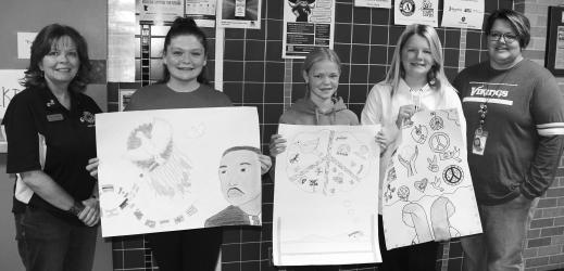 Hadley Lions Peace Poster Winners. Pictured are Lisa Saner with the Hadley Lions, 1st place Paige Schuur, 2nd place Kyra Baumgartner, 3rd place Danica Bergmann and Casey Gass.