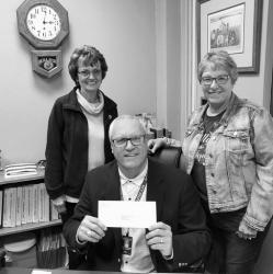 Standing Left to Right: Nancy Laible and Pam Johnson, Directors of the Murray County Foundation. Seated: Joe Meyer, Superintendant, Murray County Central High School