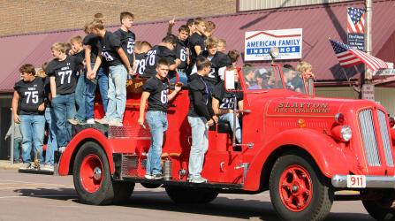 MCC Homecoming Parade: Varsity Football Team.