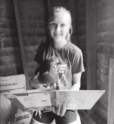 The summer reading theme at the Slayton Public Library has been animals. They held a “Pets Caught Reading” contest and enjoyed all the pictures that were sent in. Our winner was Lindsey Hause, whose chicken was caught reading with her. Thanks for all the votes on the Friends of the Slayton Public Library’s Facebook page and for the photos left in comments.