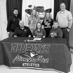 Casey Miller signs her letter of intent to play basketball and study Elementary Education at MN West Community and Technical College - Worthington. Pictured with Casey are her parents Todd and Joan Miller and her sisters Kelli and Katherine. Also are Coach Lucas Freeman, and CJ Nelson representing MN West.
